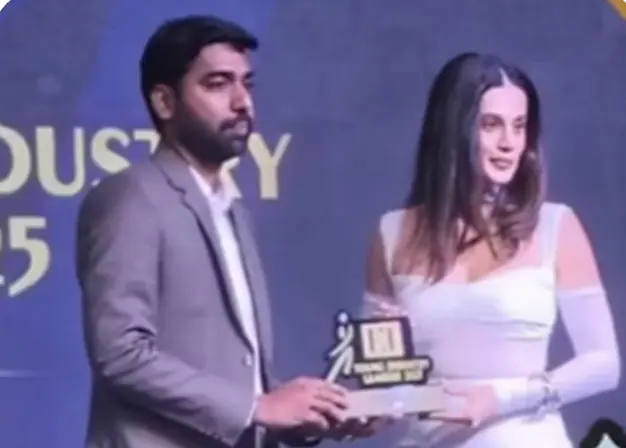 Receiving the Times of India Young Industry Leaders award