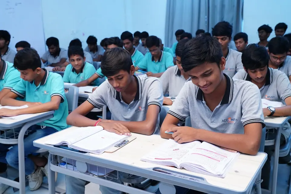 Students studying at their desks in a classroom