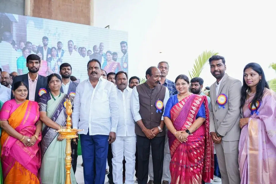 Guests and leadership at a lamp-lighting ceremony