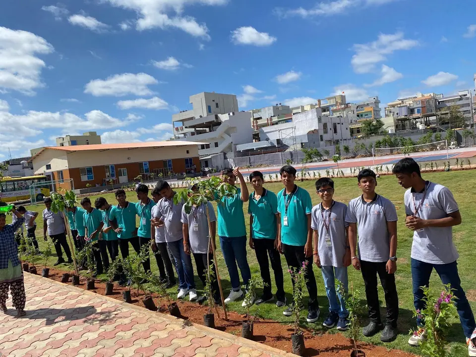 Students lined up for a tree-planting drive